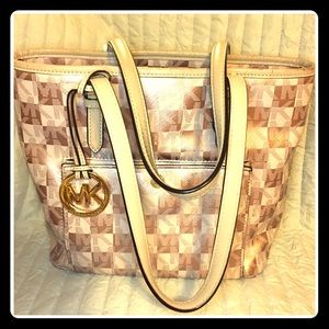 Michael Kors rose gold MK handbag